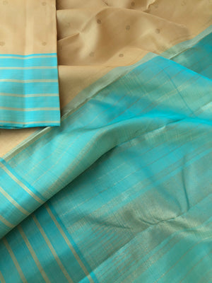 Kaviyam on Kanchivaram - creamy butter tone body with aqua blue pallu and blouse