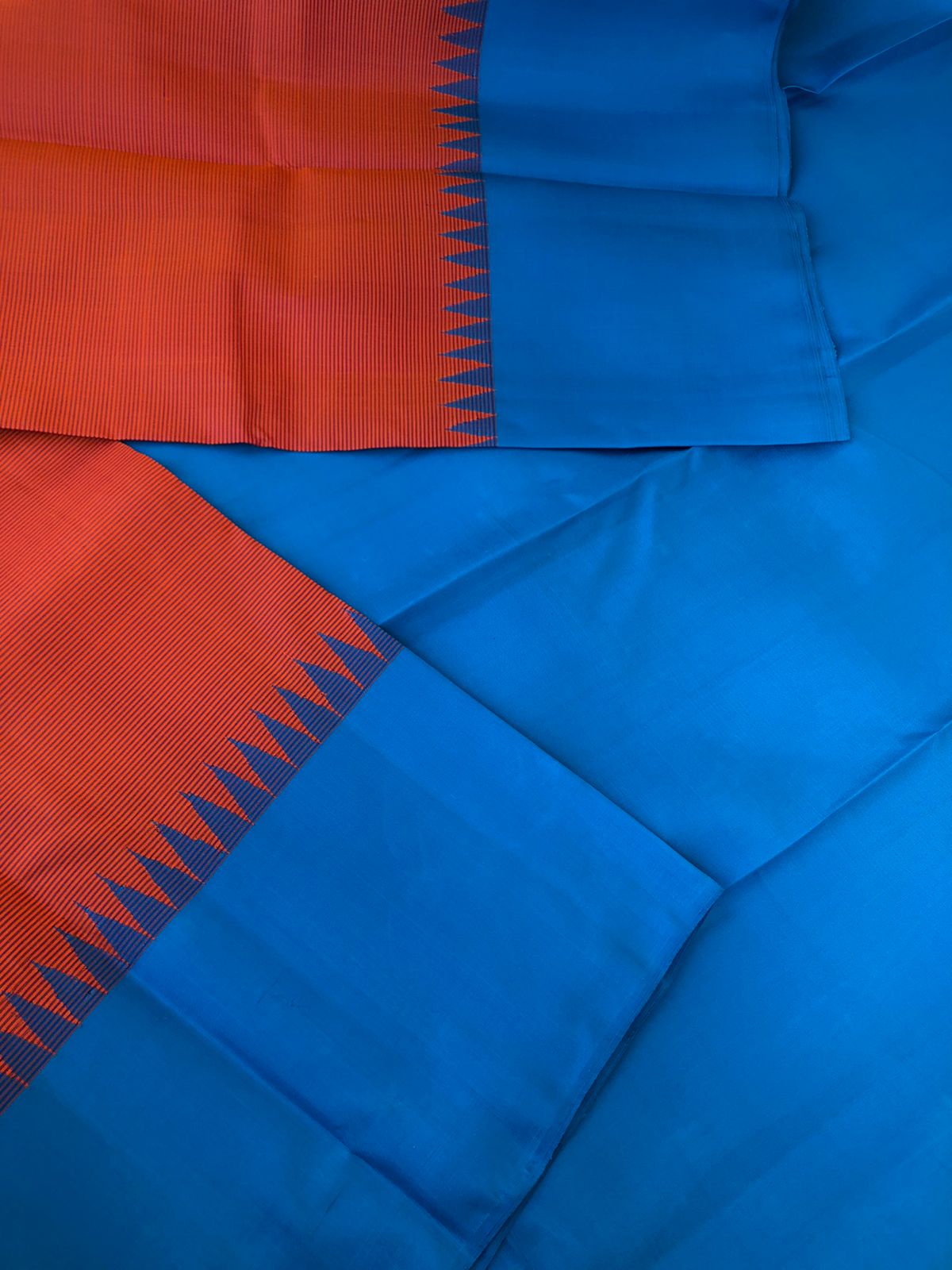 Korvai Vibes on authentic Kanchivaram - gorgeous burnt pink oosi stripes with copper sulphate blue borders pallu and blouse