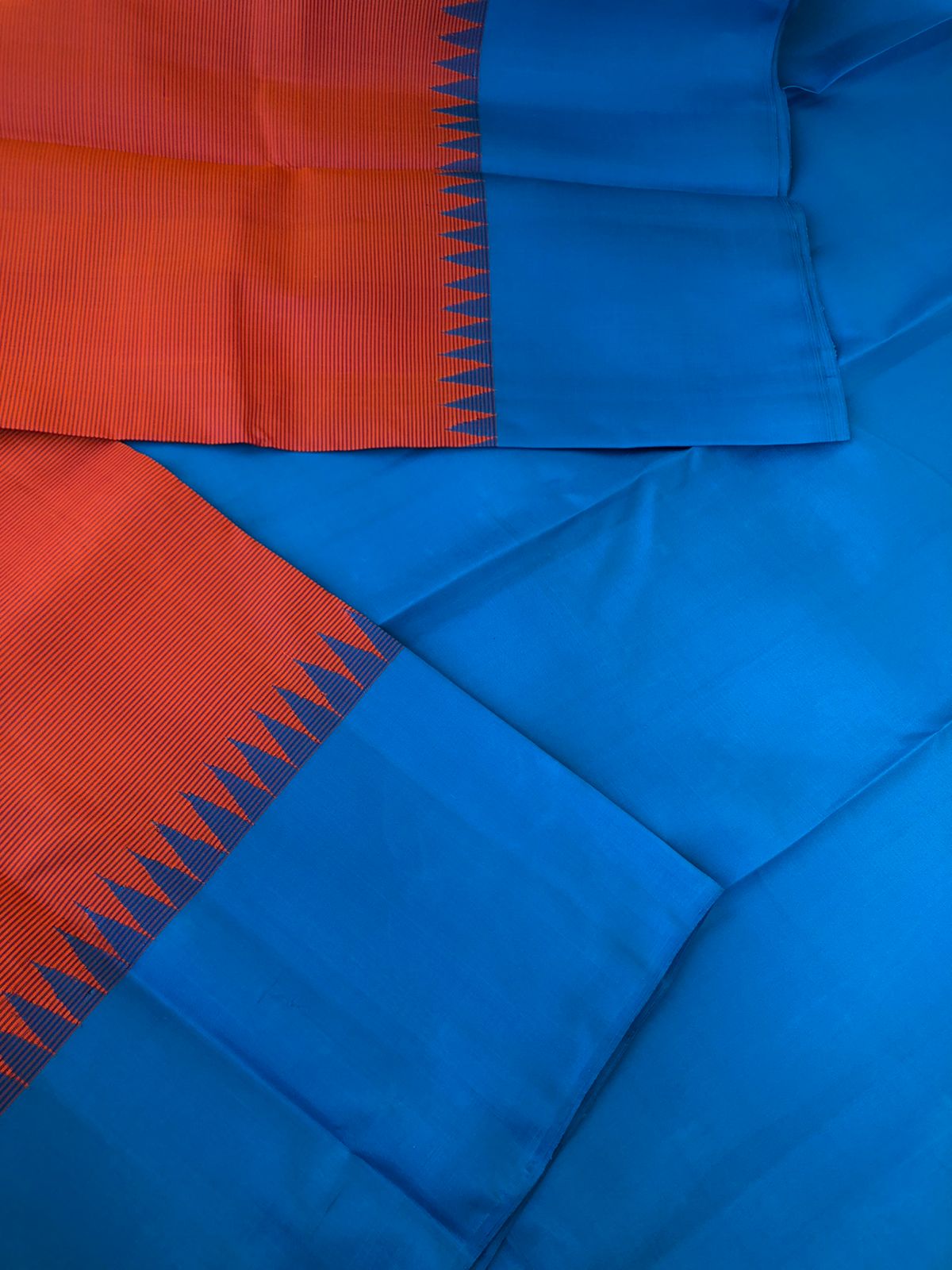 Korvai Vibes on authentic Kanchivaram - gorgeous burnt pink oosi stripes with copper sulphate blue borders pallu and blouse