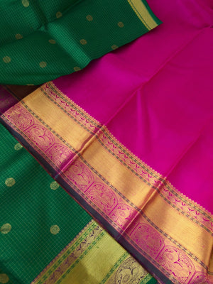 Kamakshi - Traditional kattams on Kanchivarams - most beautiful traditional green and rani pink with podi kattam ( tiny chex) with chackaram buttas over the body with densely woven pallu