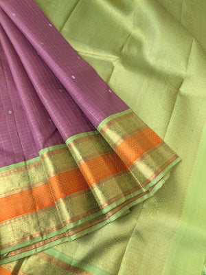 Hamsa - Limited Edition Kanchivarams - unusual dust pink and pista green korvai Kanchivaram with tiny intricate woven chex with silver and gold zari woven buttas