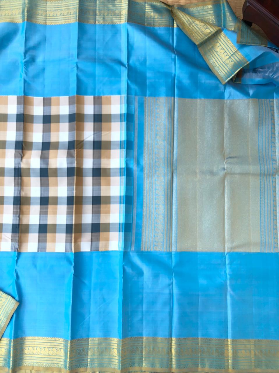 Vintage Moods on Kanchivaram - the most contemporary beauty of unusual beige cream grey chocolate chex body with sky blue korvai broad borders and pallu