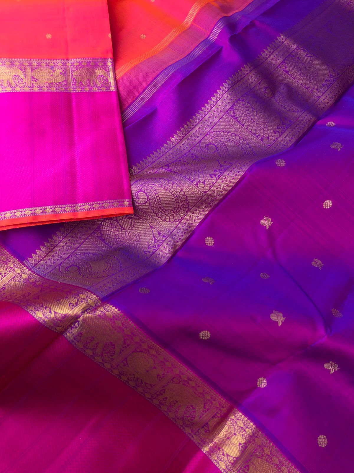 Swarnam - The lineage of Authentic Kanchivaram - a most beautiful short pink rani pink and short purple pallu woven with buttas