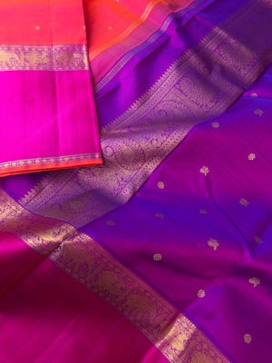 Swarnam - The lineage of Authentic Kanchivaram - a most beautiful short pink rani pink and short purple pallu woven with buttas