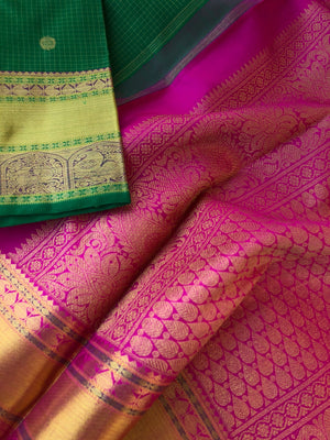 Kamakshi - Traditional kattams on Kanchivarams - most beautiful traditional green and rani pink with podi kattam ( tiny chex) with chackaram buttas over the body with densely woven pallu