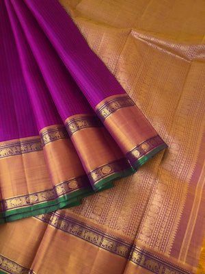 Yarn play on Kanchivaram - the deep purple pink full body vertical veldhari with retta pett woven borders and gorgeous grand gold zari woven pallu