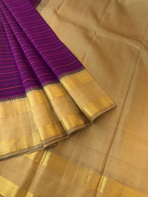 Kamakshi- Traditional Kanchivarams - deepest purple and sand beige with aarai maadam motifs woven retta pett borders
