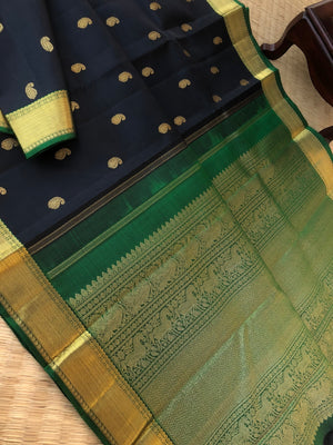 Swarnam - Black and Gold Kanchivarams - best of black and bottle green with gorgeous grand pallu and paisley buttas woven body