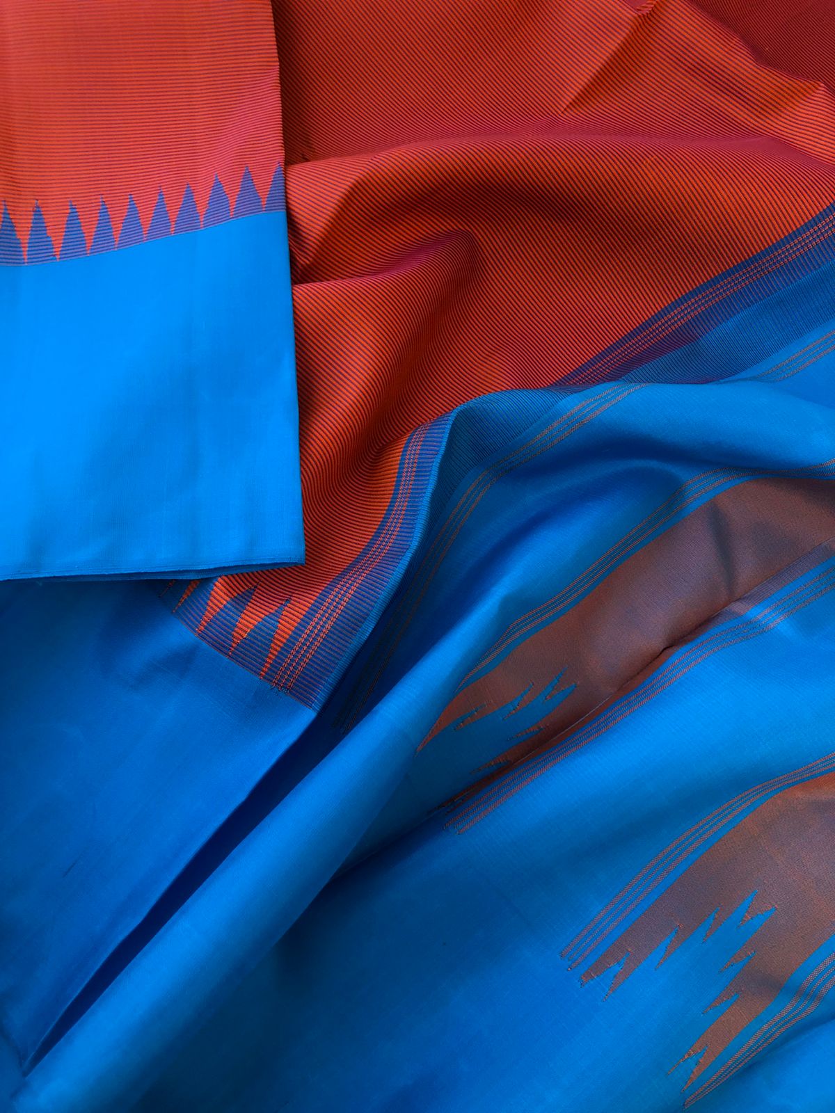 Korvai Vibes on authentic Kanchivaram - gorgeous burnt pink oosi stripes with copper sulphate blue borders pallu and blouse