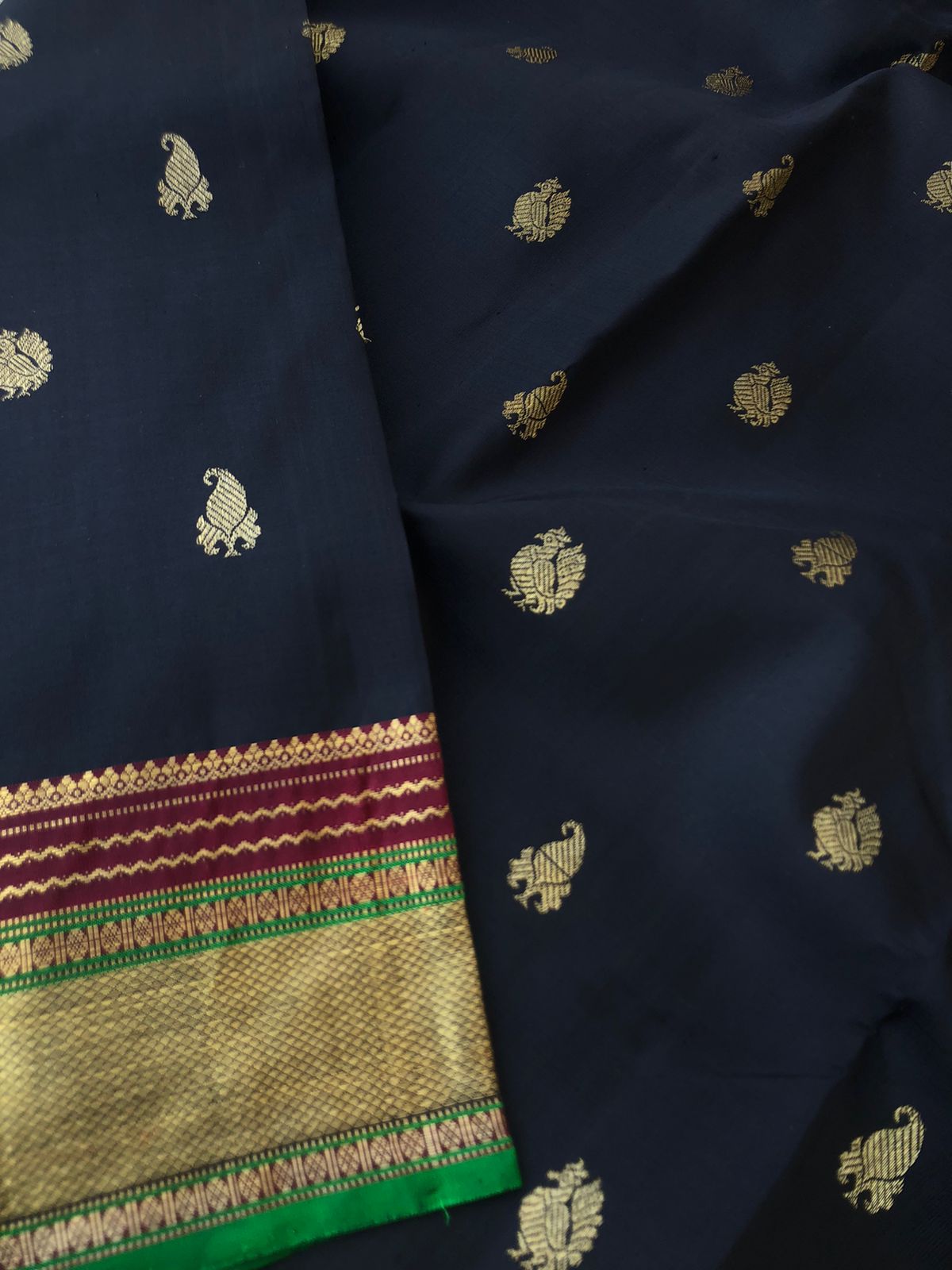 Syamah Swarnam - Black and Gold Kanchivaram - black at the best with paisley and annapakshi buttas with traditional moppula design borders