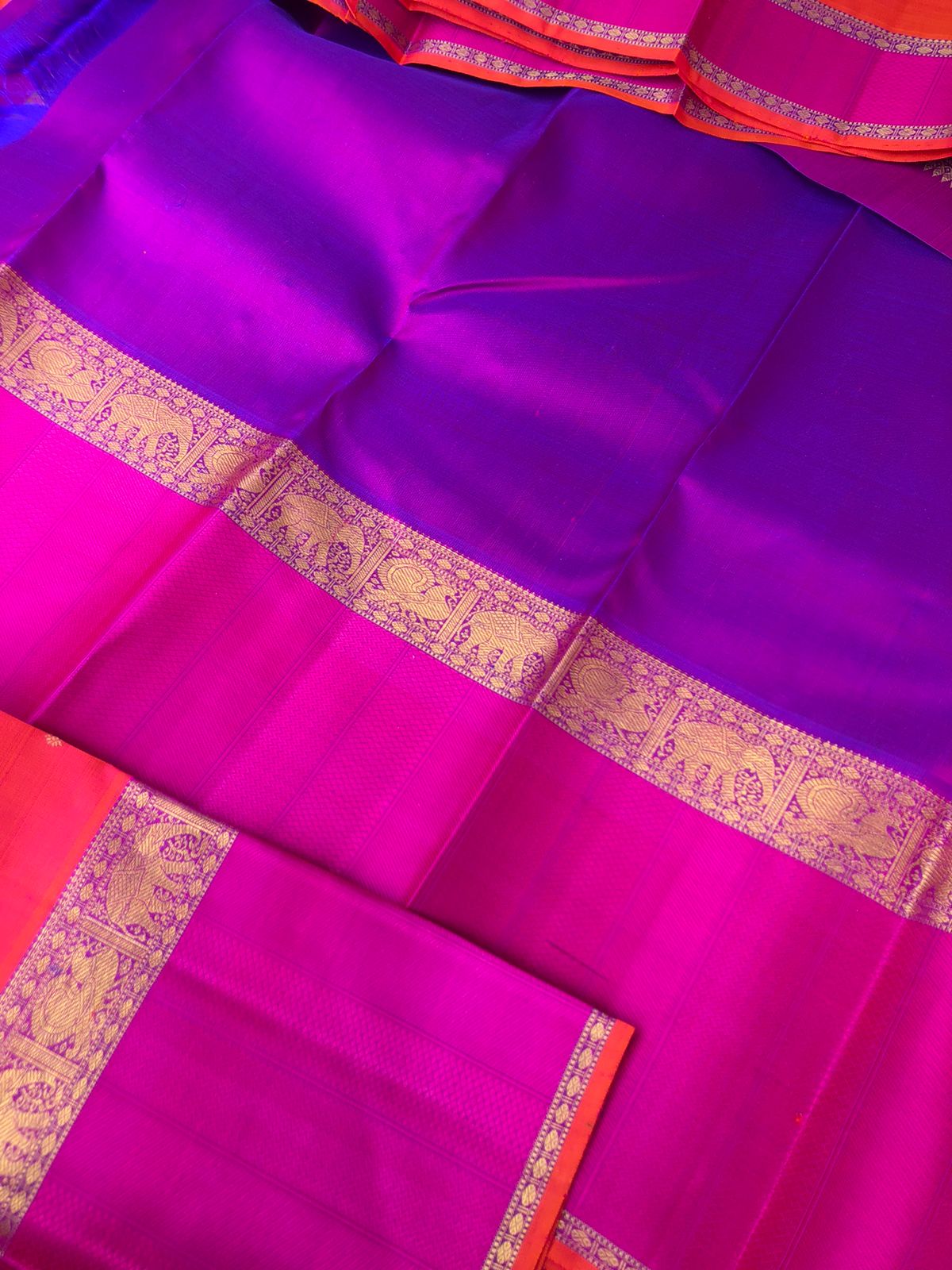 Swarnam - The lineage of Authentic Kanchivaram - a most beautiful short pink rani pink and short purple pallu woven with buttas